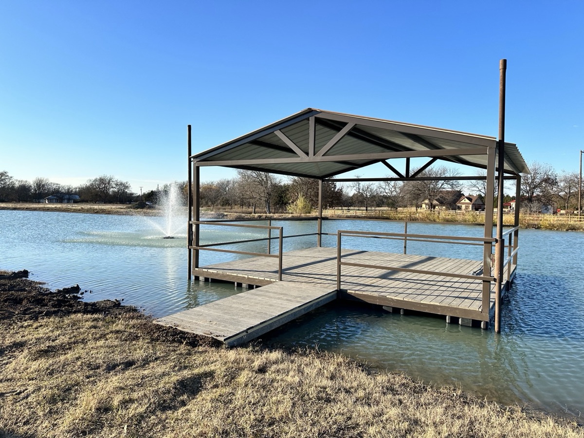 Metal boat dock canopy over the water